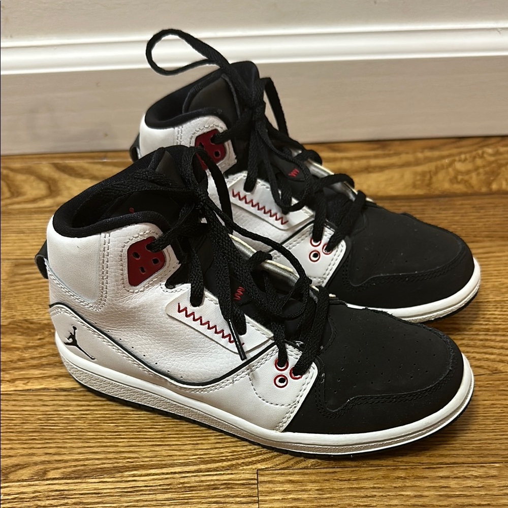 Nike Air Jordan Kids Black and White High-Top Sneakers